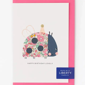 Charming Press Liberty Ladybird Birthday Card in Betsy Ann Pale Pink with biodegradable glitter hat and 'Happy Birthday Lovely' text.