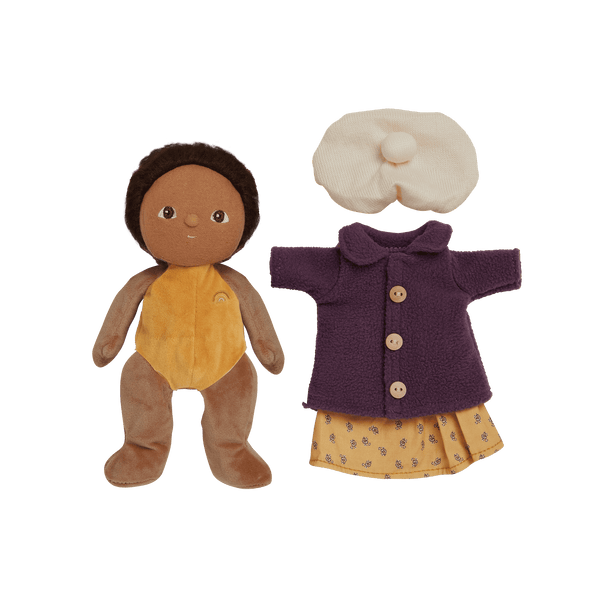 Olli Ella Dress Me Dinky Lila Lavender doll with yellow dress, purple coat, and white beanie, ready for adventures.