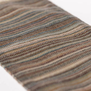 Close-up of Maileg Rug Striped Large with neutral tones, perfect for pre-order to complete any interior design, due in October.