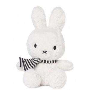 Adorable 23 cm Miffy rabbit plush toy wearing a striped scarf, perfect for winter cuddles. Hand wash only. Various colors and fabrics available.