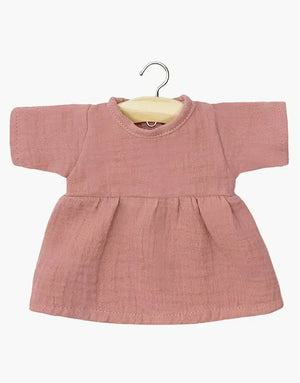 Minikane Faustine long sleeved dress in pink, perfect for 34 cm dolls, hung on a wooden hanger.