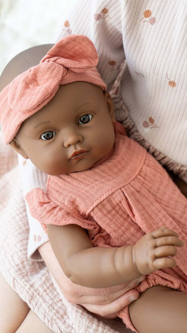 Minikane Toddlers, Augustine Dressed in Charlotte Romper and Headband (Marsala)