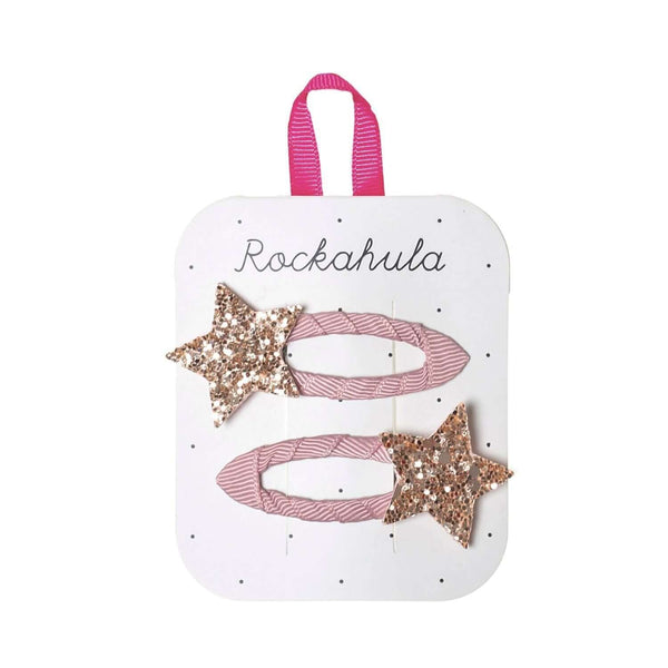 Rockahula Starlight Clips Pink, glittery rose gold stars on dusky pink grosgrain ribbon snap clips, perfect for 3 years and older.